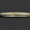 Ancient Circular Stone Sculpture With Radial Patterns And Detailed Carved Edges