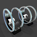 Three Circular Ring Simulators With Screens Seats And Controls For Immersive Driving Experience 3d model