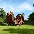 Hollow Brown Metal Sculpture In Green Grass With Trees And Blue Sky