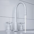 Modern Stainless Steel Kitchen Faucet with Curved Spout and Dual Handles on Black Countertop