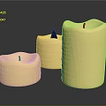 Set Of Three Cream Colored Household Candles With Various Shapes And Wicks