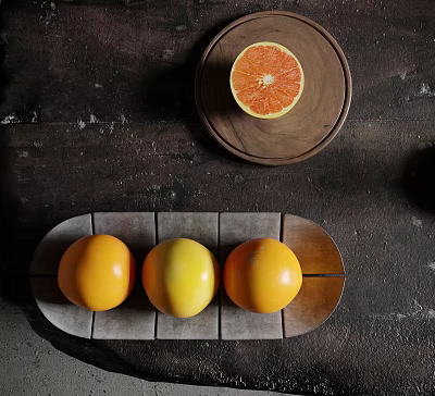 Fresh Ripe Grapefruits Arranged On Ceramic Tray And Wooden Plate 3d model
