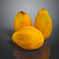 Three Ripe Yellow Papayas On Dark Reflective Surface With Smooth Skin