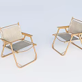 Two Foldable Outdoor Chairs With Golden Frame And Textile Seat Design