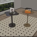 Black and Wooden Side Tables with Spiral Base Round Top and Books on Patterned Rug