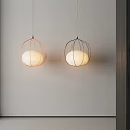 Modern Pendant Lights In Display Area With Red Black Metal Frames And White Shades