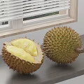 Fresh Durian Fruit With Cut Open Yellow Flesh And Whole Durian On Wooden Window Sill