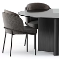 Modern Grey Upholstered Dining Chair With Slender Black Metal Legs For Stylish Home Dining Space