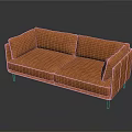 Orange Modern Two-Seater Sofa with Smooth Leather Surface and Black Legs in Interior
