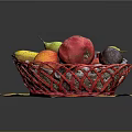 Fresh Assorted Fruits in Red Wicker Basket with Bananas Pears Apples Pomegranate on Colorful Mat