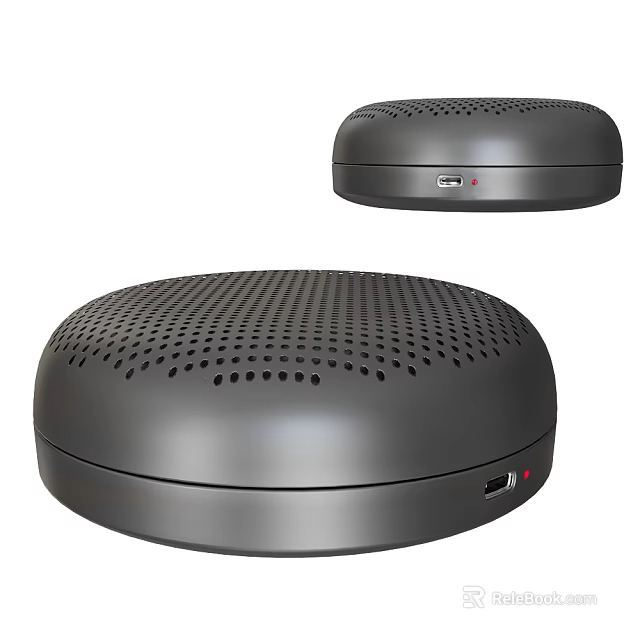 Sleek Dark Gray Round Speakers With Perforated Surface And Connectivity Ports 3d model 