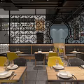 Restaurant Interior with Black Lattice Partition Blue Accent Wall Yellow Gray Chairs and Wooden Tables