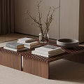 Modern Walnut Wood Coffee Table With Slatted Top And Stack Of Books Vase Branches Bowl