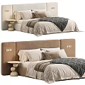 Modern Bedroom Interior With Upholstered Headboard Layered Pillows Cozy Blanket And Round Nightstand