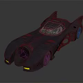 Sleek Batmobile With Bat Wing Design And Yellow Headlights On Metallic Finish
