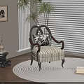 Accent Chair On Woven Rug With Striped Upholstery Near Potted Plant Books And Window Blinds