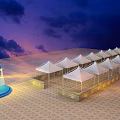 Evening Commercial Street Featuring White Canopies Blue Domed Building Paved Ground And Lighting