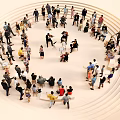 Group of People Gathered in Circular Formation Standing Sitting and Interacting Together
