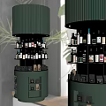 Green Cylindrical Wine Cabinet With Multi tiered Shelves Holding Wine Bottles And Small Items