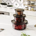 Transparent Stacked Storage Containers With Eggs Strawberries Raw Meat On Marble Dining Table In Kitchen