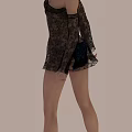 Woman Wearing Floral Lace Long Sleeve Top With Short Pants Standing