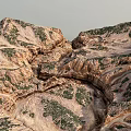 Scenic Mountain Landscape With Rocky Terrain And Green Vegetation Cover