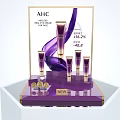 New AHC Cosmetic Skincare Collection With Purple Bottles On Display Stand