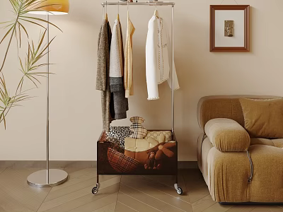 Modern Rolling Clothes Rack With Hanging Clothes And Storage Basket In Cozy Living Room 3d model