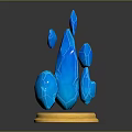 Blue Crystal Decorative Ornament With Golden Base And Multiple Different Shaped Blue Crystals