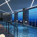 Elegant Indoor Swimming Pool With Large Windows City Night View Loungers And Marble Walls