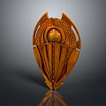 Ornate Golden Shield With Central Circular Ornament And Intricate Carvings