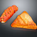 Freshly Baked Braided Bread And Triangular Flaky Pastry On