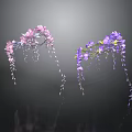 Hanging Pink And Purple Flowers With Long Trailing Blooms On Dark Background