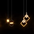 Modern Pendant Lights With Contemporary Geometric Shapes And Metal Finish Illuminated On Black Background