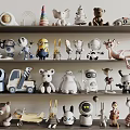 Assorted Cute Dolls Collection With Bear Robot Rabbit Deer On Decorative Shelves