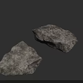 Two Gray Natural Stone Pieces With Textured Surface On Black Background
