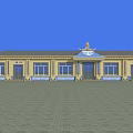 Traditional Yellow Building With Blue Decorative Roof Windows Doors And Paved Square Front