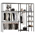 Clothing Rack Displaying Various Clothes Bags And Shoes