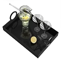Refreshing Cocktail Drink in Glass with Ice Cubes and Lemon on Black Tray with Martini Glass