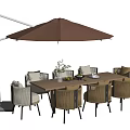 Outdoor Patio Table with Brown Umbrella and Wicker Chairs for Garden Dining Area