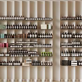 Neatly Organized Shelves Displaying Various Bottles In Orderly Arrangement