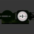 Green Military Style Compass with Ruler Scale Fluorescent Markers and Metal Casing on Dark Background