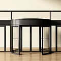 Modern Revolving Door Design With Black Frame Glass Panels And Wooden Floor