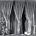 Gray and Dark Green Velvet Curtains with Tiebacks and Green Plants in Sunlight