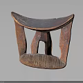 Traditional African Handcarved Wooden Stool With Curved Seat And Sculpted Legs