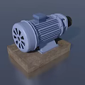 Blue Industrial Electric Motor On Concrete Base With Metal Shaft Housing
