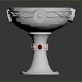 Silver Metal Goblet Shaped Sculpture Carving With Intricate Decorative Details And Red Gemstones On Base