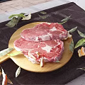 Raw Steak On Wooden Cutting Board With Fresh Bay Leaves And Orange Zest