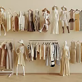 Mannequins Showcasing Neutral Tones Clothing With Dresses And Hangers In Fashion Store