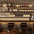 Modern Bar Interior With Pendant Lights Wooden Tables And Liquor Bottle Shelves